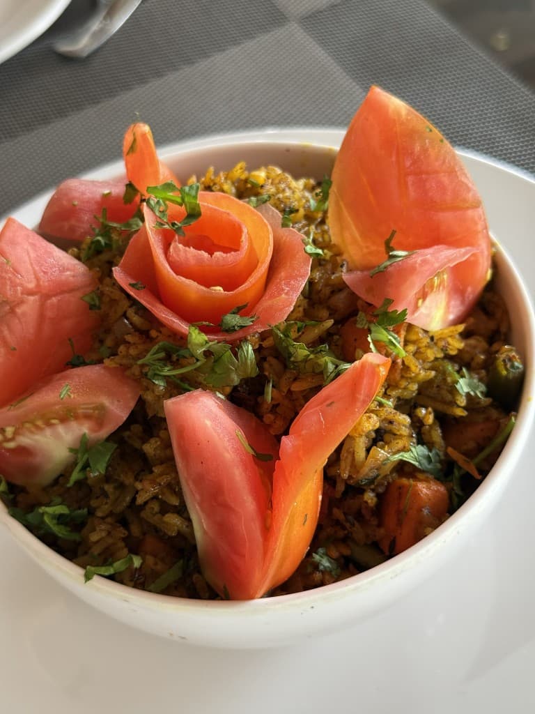 Spiced rice bowl garnish close-up